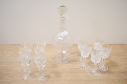 A late 19th to early 20th-century crystal cut glass decanter with six small sherry glasses; sold