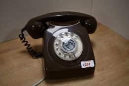 A vintage British Telecom Brown Rotary Telephone, having a 1977 The Queen's Silver Jubilee rotary