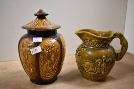 A 20th-century Sylvac Pottery lidded ginger jar, featuring raised peacock and floral relief decorat