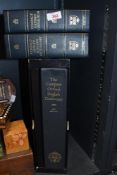 A large vintage Compact Oxford English Dictionary; sold with the Compact Oxford Thesaurus and