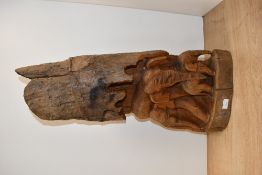 A large vintage African Art wood wall carving, featuring a family of elephants, hanging fixture to