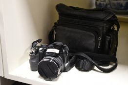 A Fugifilm Finepix S 14 mega pixel digital camera with Super EBC Fujinon 30xzoom f=4.3-129.0 1:3.1-