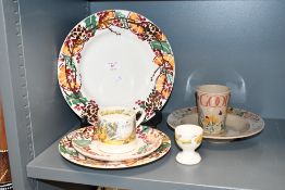 An Emma Bridgewater pottery 'Holly Wreath' plate trio, featuring a festive botanical border upon