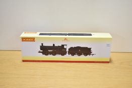 A Hornby OO gauge model steam locomotive and tender, BR 0-6-0 Drummond 700 Class 30316 Weathered
