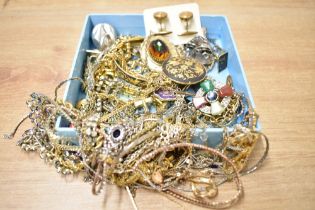 A collection of costume jewellery, including neck chains, rings, cufflinks and statement pieces