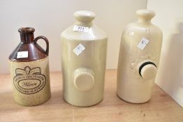 Two vintage stoneware hot water bottles and a Brown Brothers Milawa Vineyard Australia advertising