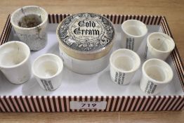 A Victorian iron stone advertising pot for 'cold cream', featuring a monochrome gothic-style