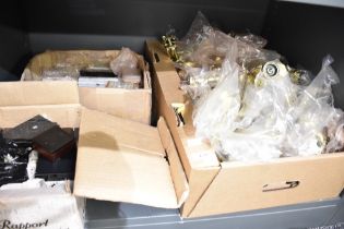 A carton of mainly gold tone trophy toppers of various themes to include darts, football, horse