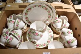 A quantity of 20th-century Colclough bone china floral tablewares, featuring pink rose detailing