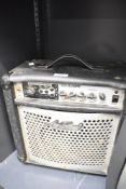 A Jay Turser GA-15 DSPR practice amp