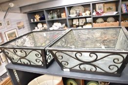 Two large 20th-century decorative metal light fittings/shades, having removable glass inserts,