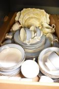 A Royal Doulton part dinner service having a powder blue band with gilt edging (30) sold with a