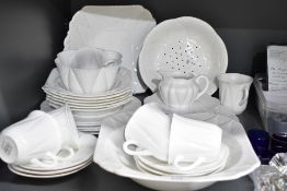 A 20th-century Shelley fine bone china part dinner service, to feature delicate petal-formed