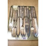 A small quantity of Victorian silver-plated metal knifes and forks, to feature ornate foliate and