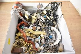 An assortment of costume jewellery, including agate bead necklaces, statement pieces, clip-on