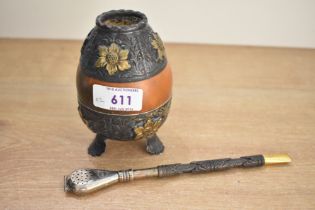 A vintage Argentine yerba mate gourd cup, having floral and foliate silver-plated and gilt
