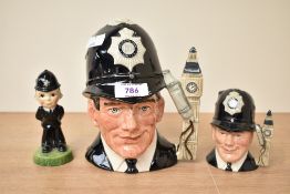 Two Royal Doulton 'London Bobby' Toby jugs one large and one small sold along with a Carlton Ware '