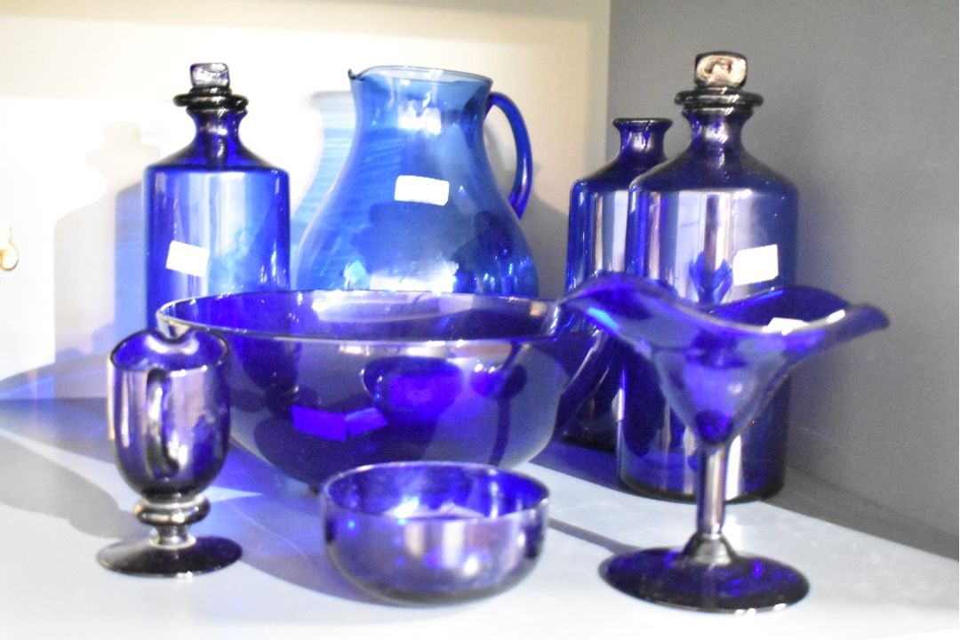 A collection of cobalt Bristol blue art glass items including a pair of mouth blown apothecary - Image 1 of 2