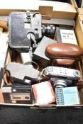 A box of camera equipment including Yashica U Matic cine camera, Ilford Sportsman, a small Kodak Box
