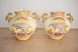 Two Victorian S. Fielding and Company pottery baluster vases with double gilded handles, renamed