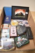 A small collection of vintage tins, an autograph album and a framed photograph of Stonehenge after