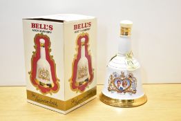 A Bells Whisky commemorative porcelain 75cl 'Bell' decanter, sealed, produced to commemorate the