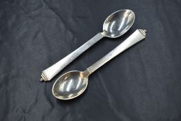 A pair of vintage Georg Jensen Pyramid pattern teaspoons, marks for 1933-44, London import marks