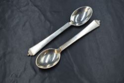 A pair of vintage Georg Jensen Pyramid pattern teaspoons, marks for 1933-44, London import marks