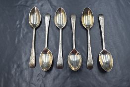 A cased set of six George V silver coffee spoons, having bright-cut style engraving and 'H'