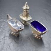 A George VI silver three piece condiment set, comprising salt, mustard and pepper, of rectangular