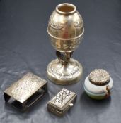 A white metal South American style mate cup, having scroll decoration raised on a decorative step