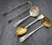 A late Victorian silver sugar sifter, of traditional form having ivy decoration to the terminal with