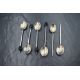 A cased set of six George V silver coffee bean spoons, having black 'beans' to terminals, two - Image 1 of 2
