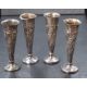 A group of four Victorian and Edwardian silver vases, of fluted form having embossed floral and - Image 2 of 2