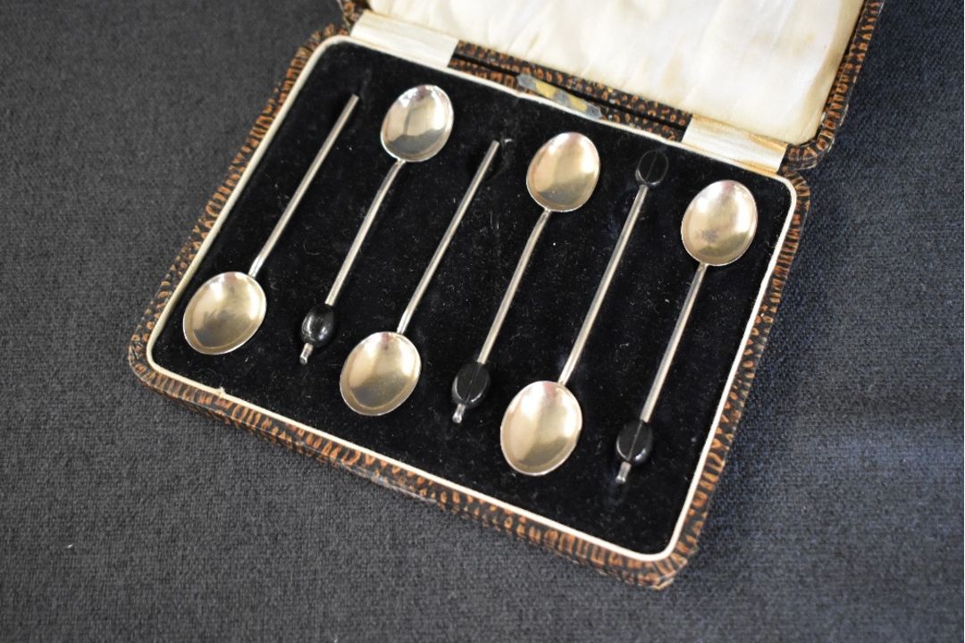 A cased set of six George V silver coffee bean spoons, having black 'beans' to terminals, two - Image 2 of 2
