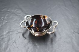 A Victorian silver and tortoiseshell dish, the circular bowl lined with tortoiseshell, having