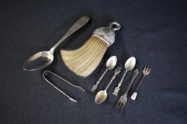 A Victorian silver mounted horse hair crumb brush, having scroll decoration, marks for Birmingham