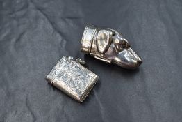 A 20th century novelty silver vesta case, modelled as a hound dog's head, marked 925, along with a