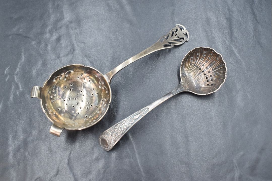 A Victorian silver sugar sifter, of traditional form having scroll decoration to terminal, along - Image 2 of 3