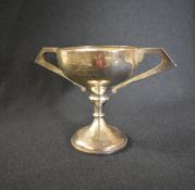 A George V silver trophy, of traditional form having 'SEASCALE GOLF CLUB FOURSOMES 1931...' engraved