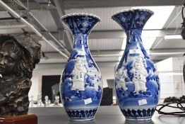 A pair of 20th century Japanese style blue and white vases of baluster form with everted and crimped
