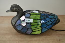 A contemporary Tiffany-style Duck table lamp, featuring a textural metal head and base with a