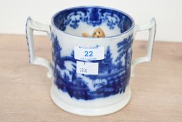 A Victorian Cork, Edge & Malkin 'Singa' Flow blue ironstone loving cup, featuring a blue and white
