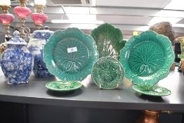 Three late 19th to 20th-century Wedgwood Majolica cabbage leaf-style wares, to two plates and a