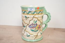A early 20th-century Charlotte Rhead for Crown Ducal ceramic 'Caliph' jug, featuring floral and