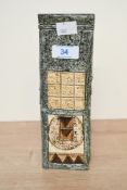 A vintage Troika Pottery (1963-1983) coffin vase after Louise Jinks, having a textured beige,