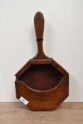 An early 20th-century wooden ecclesiastical offertory box of octagonal form, featuring a smooth