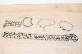 An assortment of white metal jewellery including a large belcher link chain and a hematite set