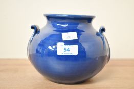 A fine late 19th to early 20th-century Art Nouveau Liberty of London blue glazed pottery vase,