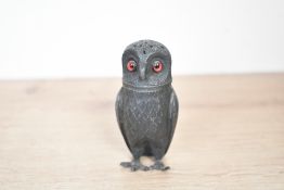 A late 19th to early 20th-century pewter novelty pepperette, modelled as an owl, having intricate